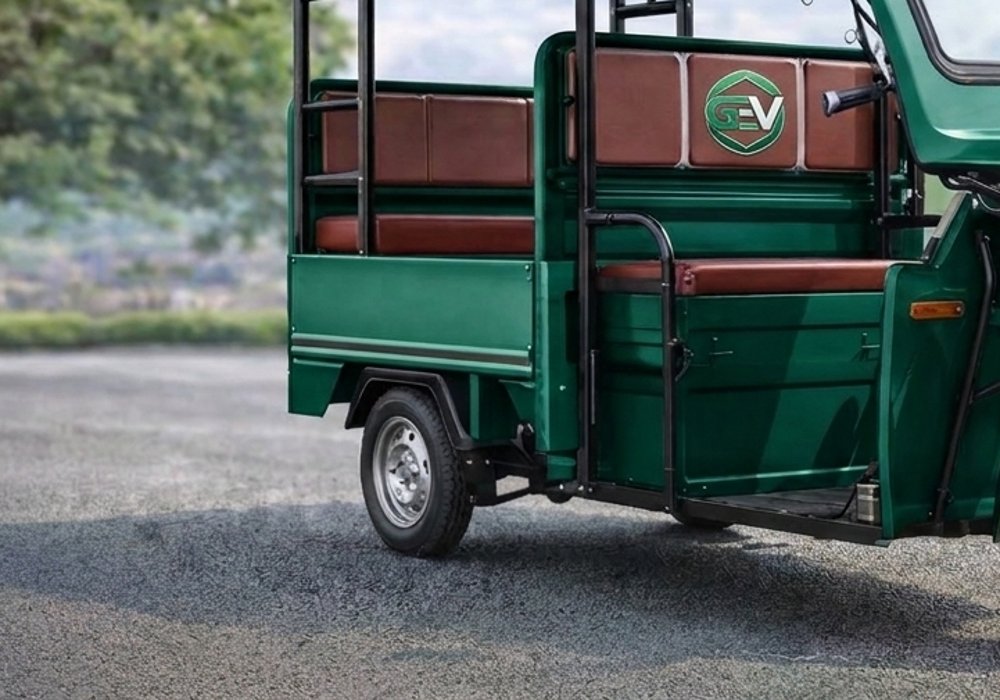GEV electric rickshaw, cabin detail with logo